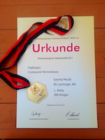 Urkunde mit Goldmedaillie von Sascha M.